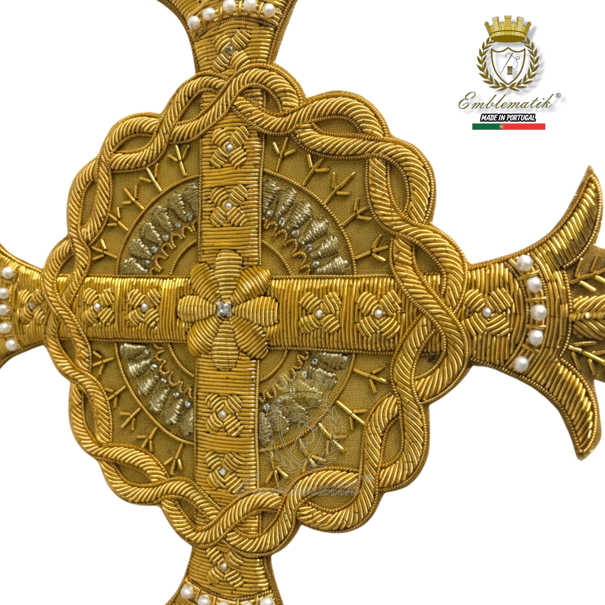Emblematik by Pasamanerias y Bordados gold metal thread cross with pearl accents for liturgical vestments.