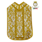 Emblematik by Pasamanerias y Bordados gold and white Roman chasuble vestment set with ornate damask pattern.