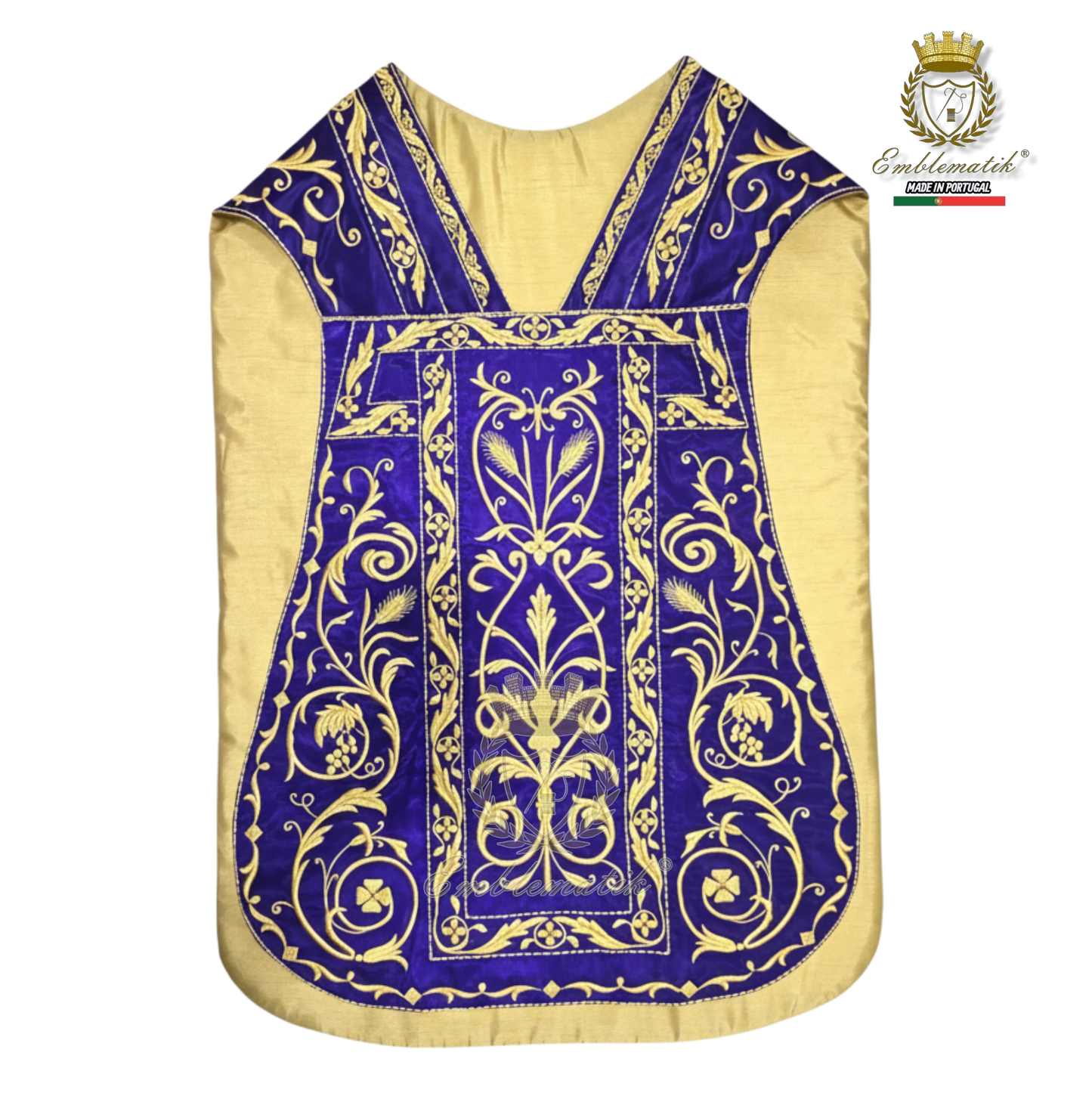 Emblematik by Pasamanerias y Bordados Roman Chasuble in purple with gold metallic embroidery of Agnus Dei and floral motifs.