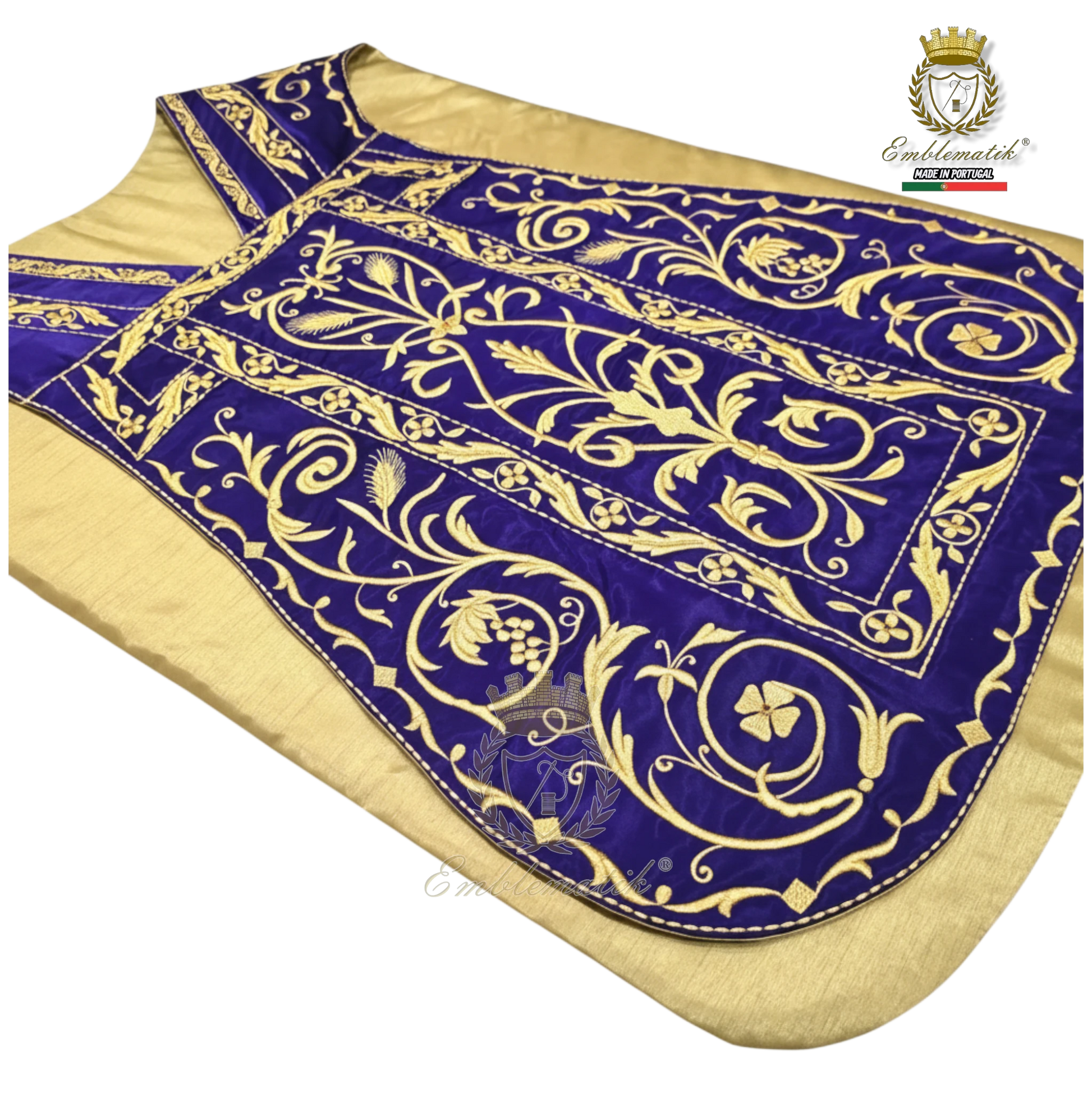 Emblematik by Pasamanerias y Bordados Roman Chasuble in purple velvet with gold metallic embroidery of floral motifs and Agnus Dei.