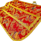 Emblematik by Pasamanerias y Bordados red Roman vestment low mass set with gold trim and intricate peacock and floral patterns.