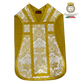 Emblematik by Pasamanerias y Bordados white and gold floral Roman chasuble with ornate trim.